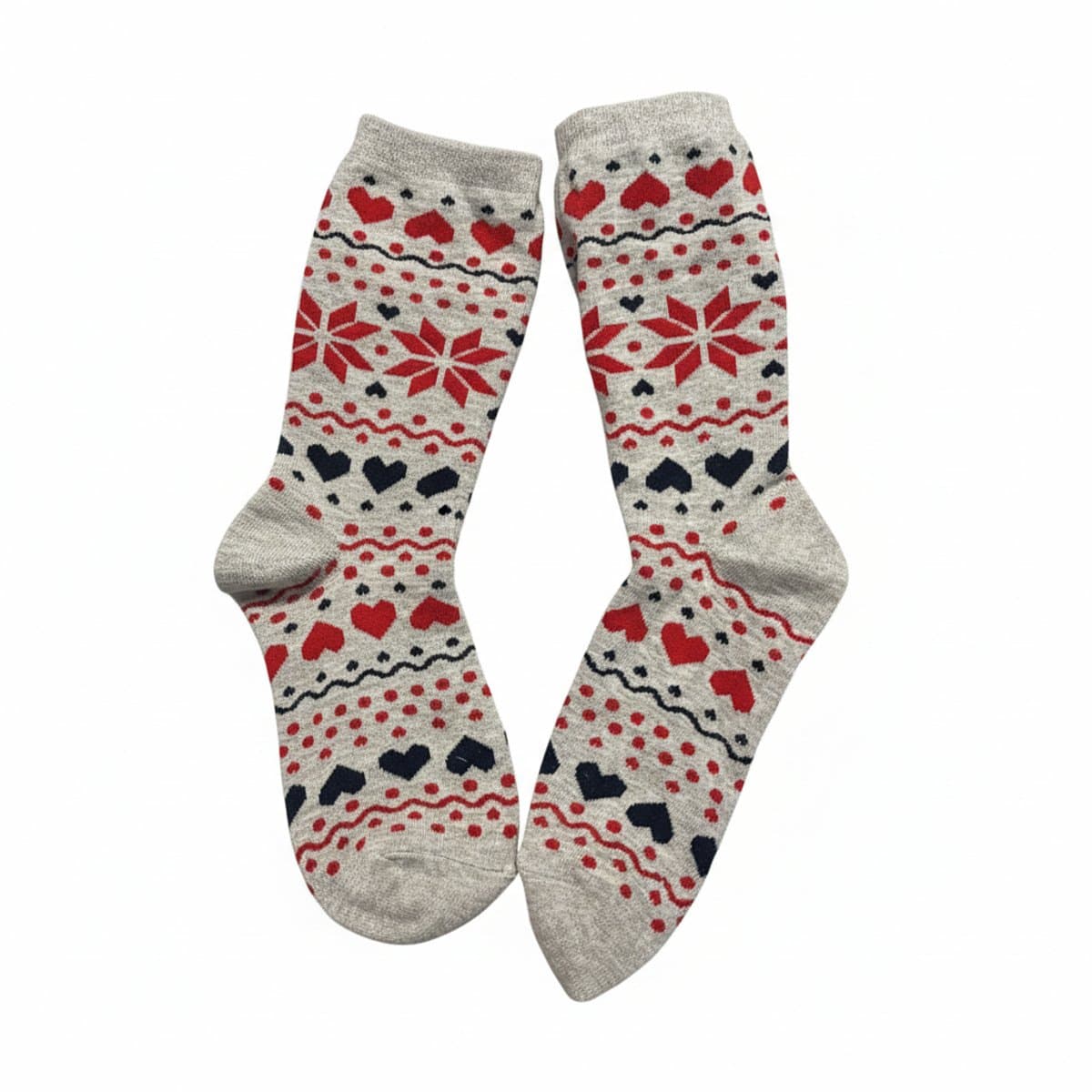 Pair of soft heather grey knit socks featuring a red and navy blue Fair Isle pattern with hearts, perfect for cozy winter lounging, available at handpicked306 boutique in Carlyle SK.