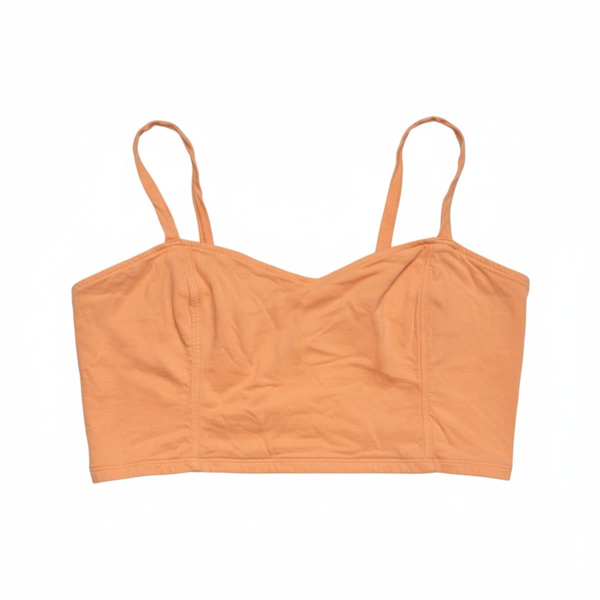 Women's minimalist peach cropped camisole with structural seam detailing, available at handpicked306 boutique in Carlyle SK.