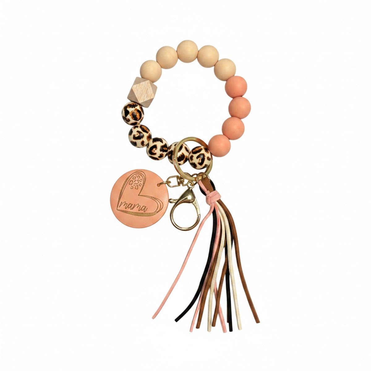 Boutique-style Mama heart silicone bead keychain with leopard print accents and a multi-colored tassel, available at handpicked306 boutique in Carlyle SK.