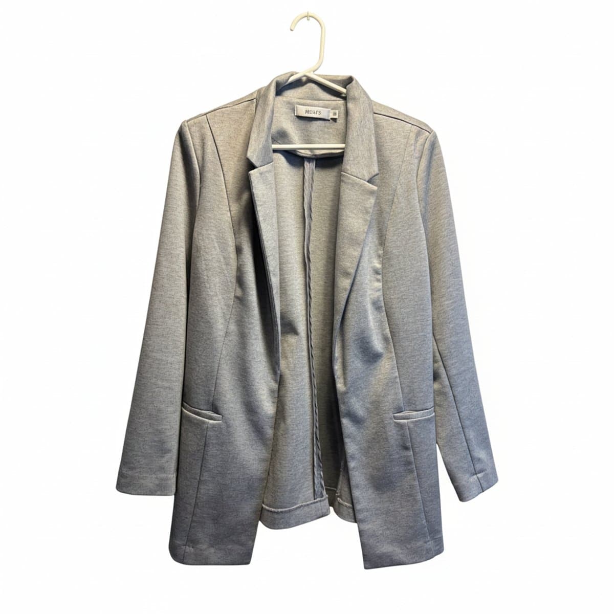 The New Tactility: Redefining the Mid-Week Uniform with Conscious Essentials