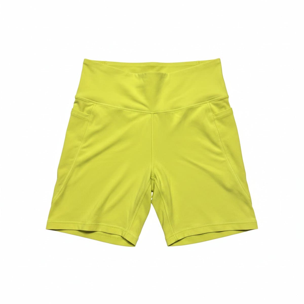 Women's high-waisted neon lime athletic biker shorts with side pockets, vibrant color for gym or streetwear, available at handpicked306 boutique.