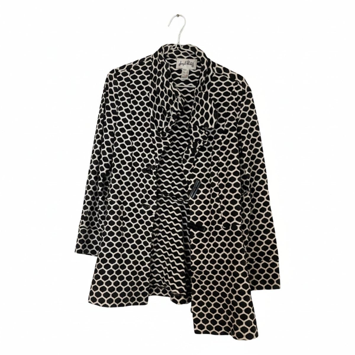 Joseph Ribkoff women's blazer in black and white geometric pattern, featuring a ruffled collar and structured fit, available at handpicked306 boutique in Carlyle SK.