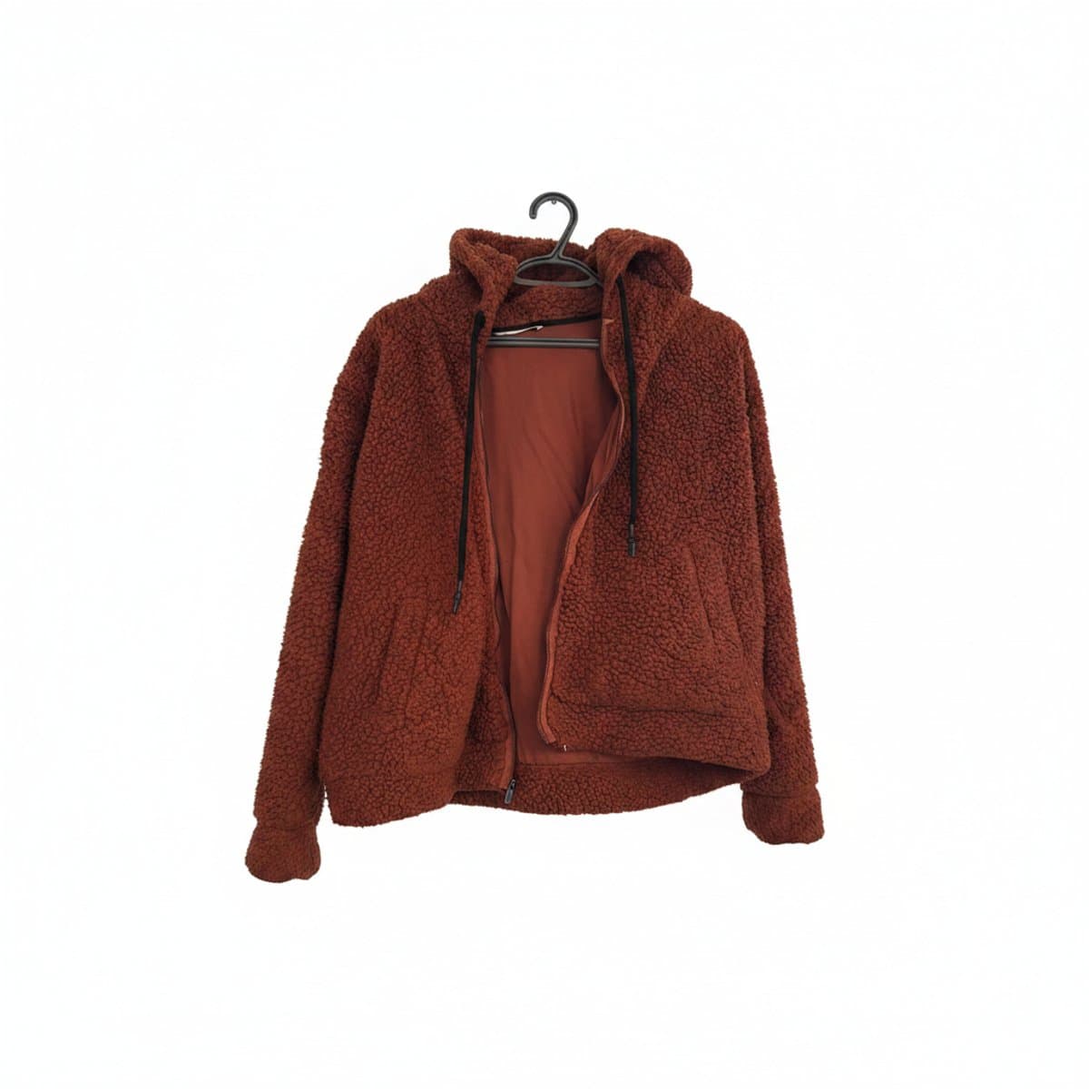 Women's plush terracotta teddy fleece zip-up hoodie with black drawstring, cozy high-pile texture, available at handpicked306 boutique in Carlyle SK.