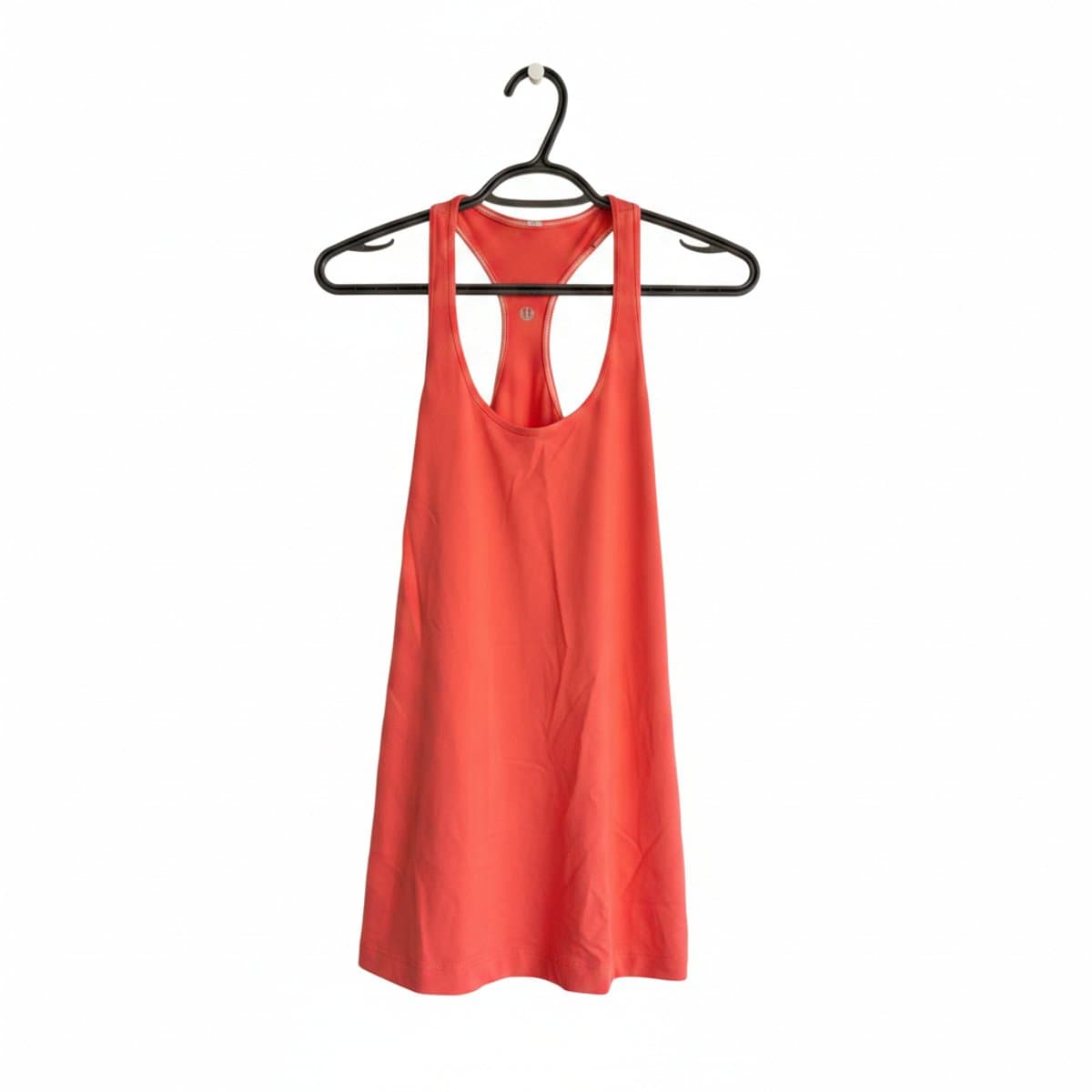 Lululemon women's vibrant coral racerback tank top, lightweight performance athletic wear, available at handpicked306 boutique in Carlyle SK.