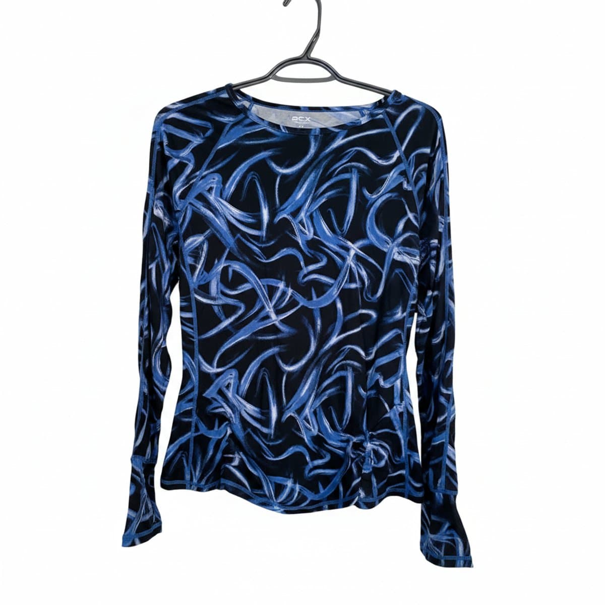 ACX women's long sleeve performance top with blue and black abstract swirl print, athletic fit, available at handpicked306 boutique.