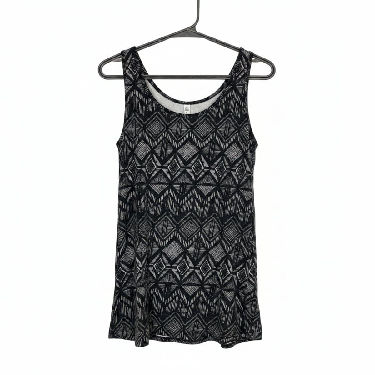 Women's black and white tribal print tank top with geometric patterns, scoop neck, casual aesthetic, available at handpicked306 boutique in Carlyle SK.