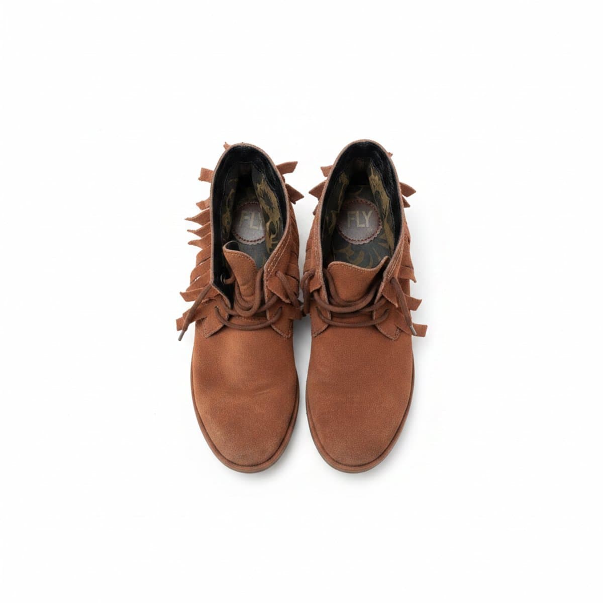 Pair of Fly London brown suede ankle boots with fringe detail, bohemian style, available at handpicked306 boutique.