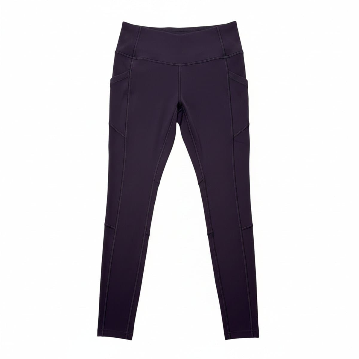 Women's Lululemon performance leggings in dark purple, high-rise fit with athletic seam detailing, available at handpicked306 boutique in Carlyle SK.