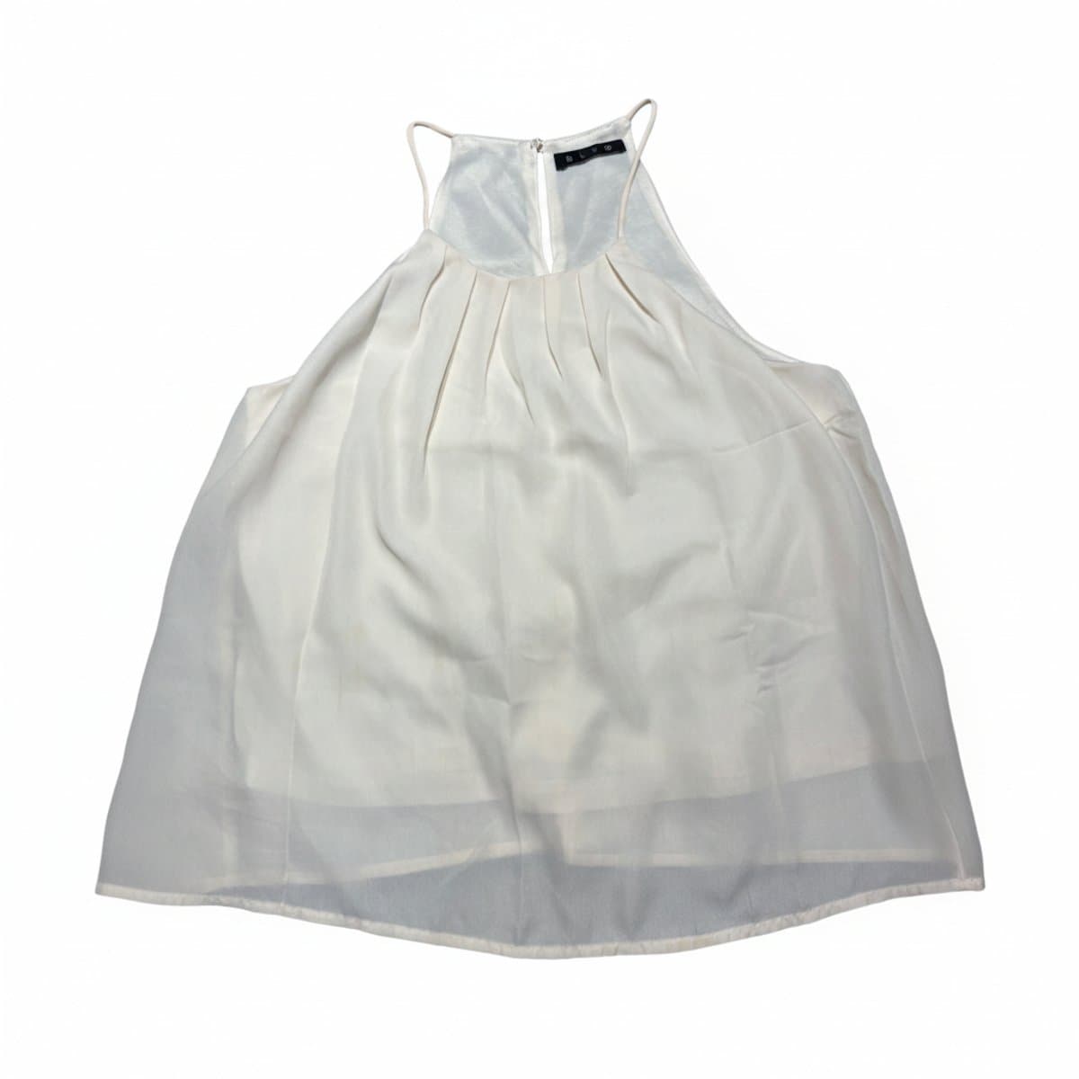 Women's cream-colored pleated halter top by BLVD with a flowy, minimalist silhouette, available at handpicked306 boutique.