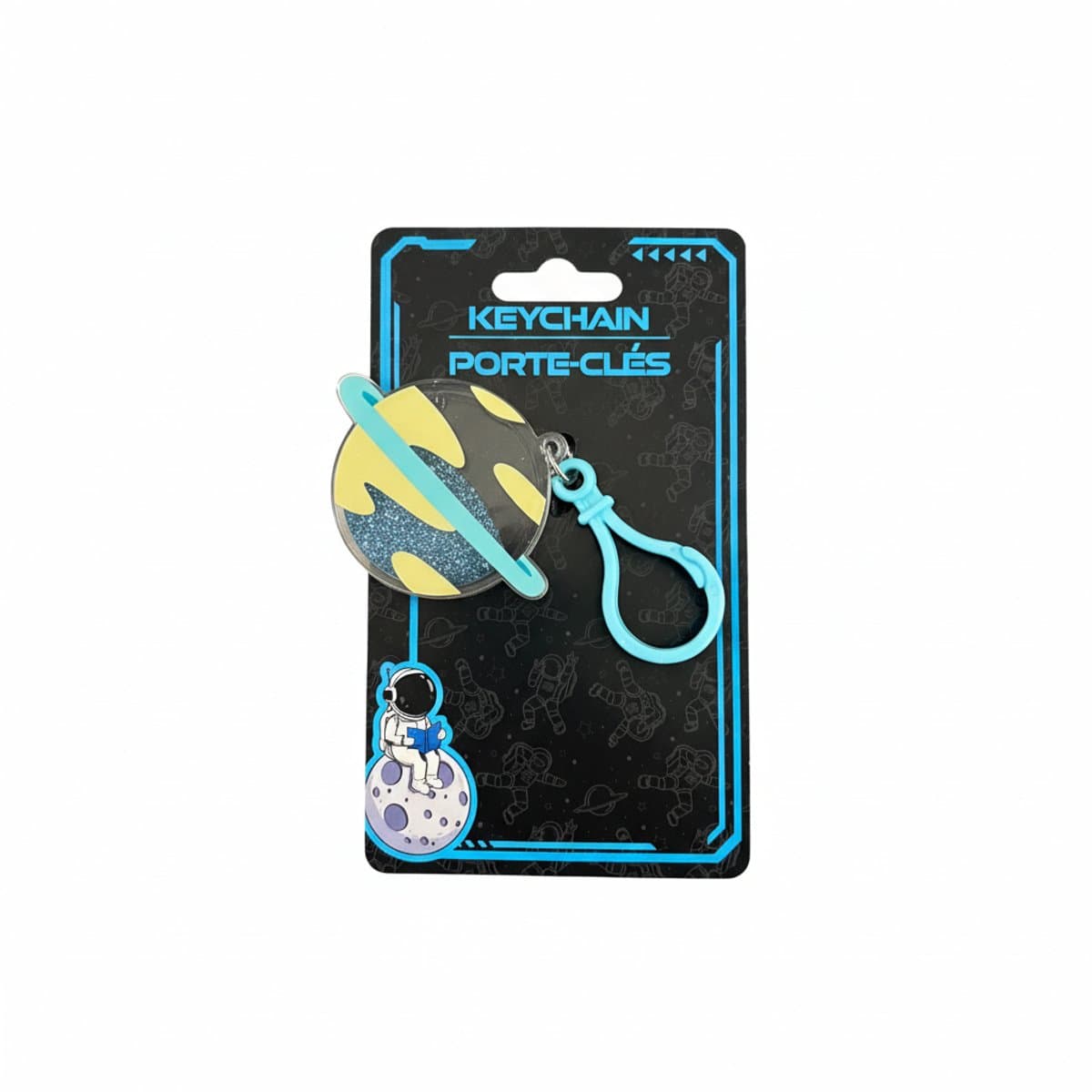 A new with tags blue glitter Saturn planet keychain with a sky-blue snap-hook, featuring a celestial space aesthetic, available at handpicked306 boutique.